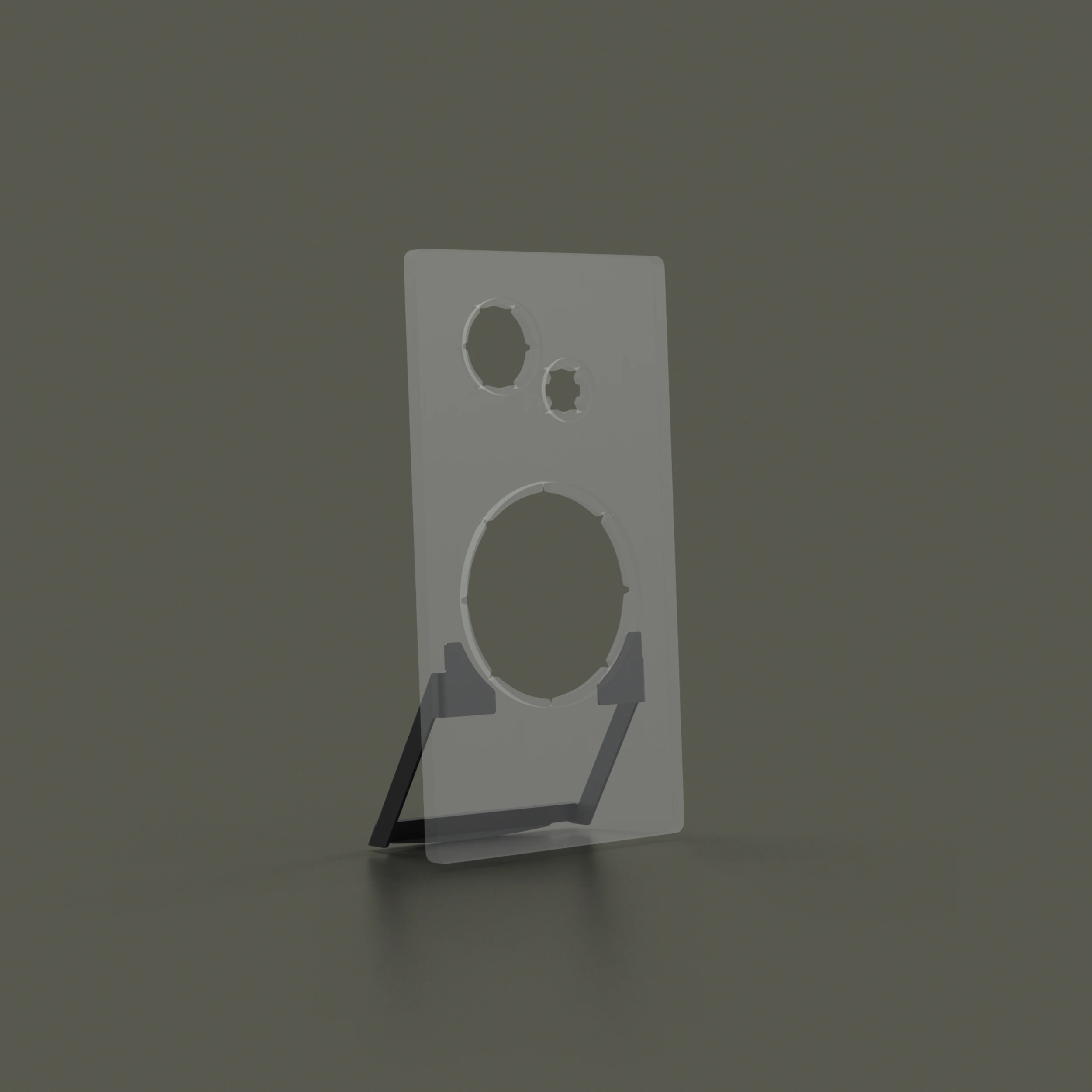 Transparent phone stand with circular cutouts, supported by a black angled base on a gray surface.